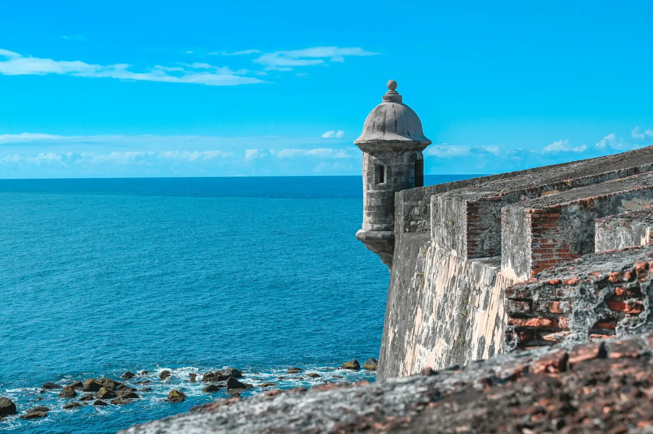 A view of the ocean from a stone wall