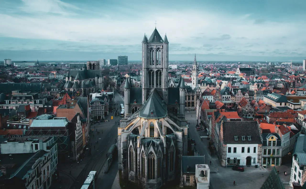 Above the roofs looking on Sint-Niklaaskerk church in Gent, Belgium