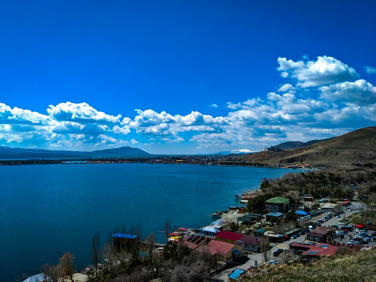 a view of a lake with a lot of houses on it