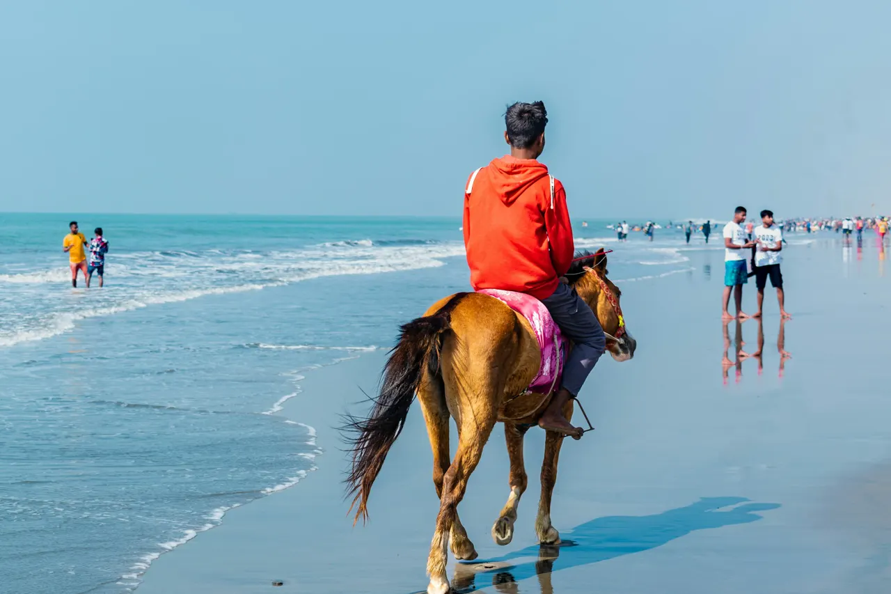 A boy horse riding