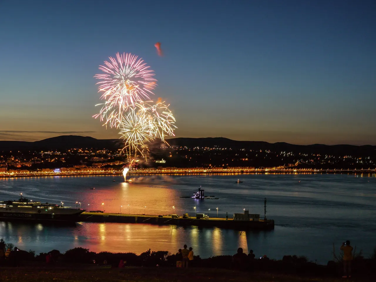 Fireworks reflecting in the sea, Douglas Bay, Isle of Man