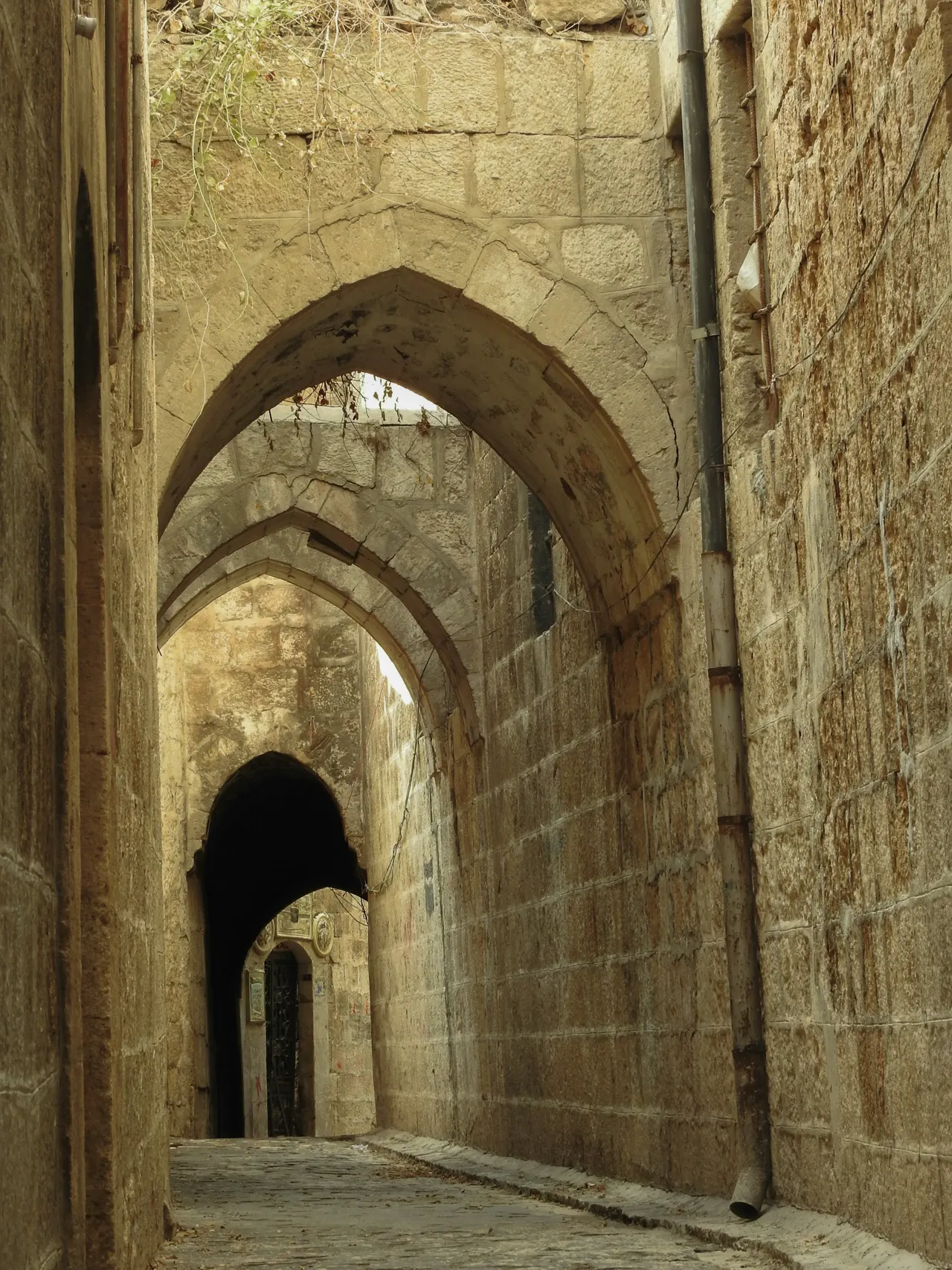 Stone arches from Al-Riqbi neighborhood in the Bab Qinnasrin neighborhood