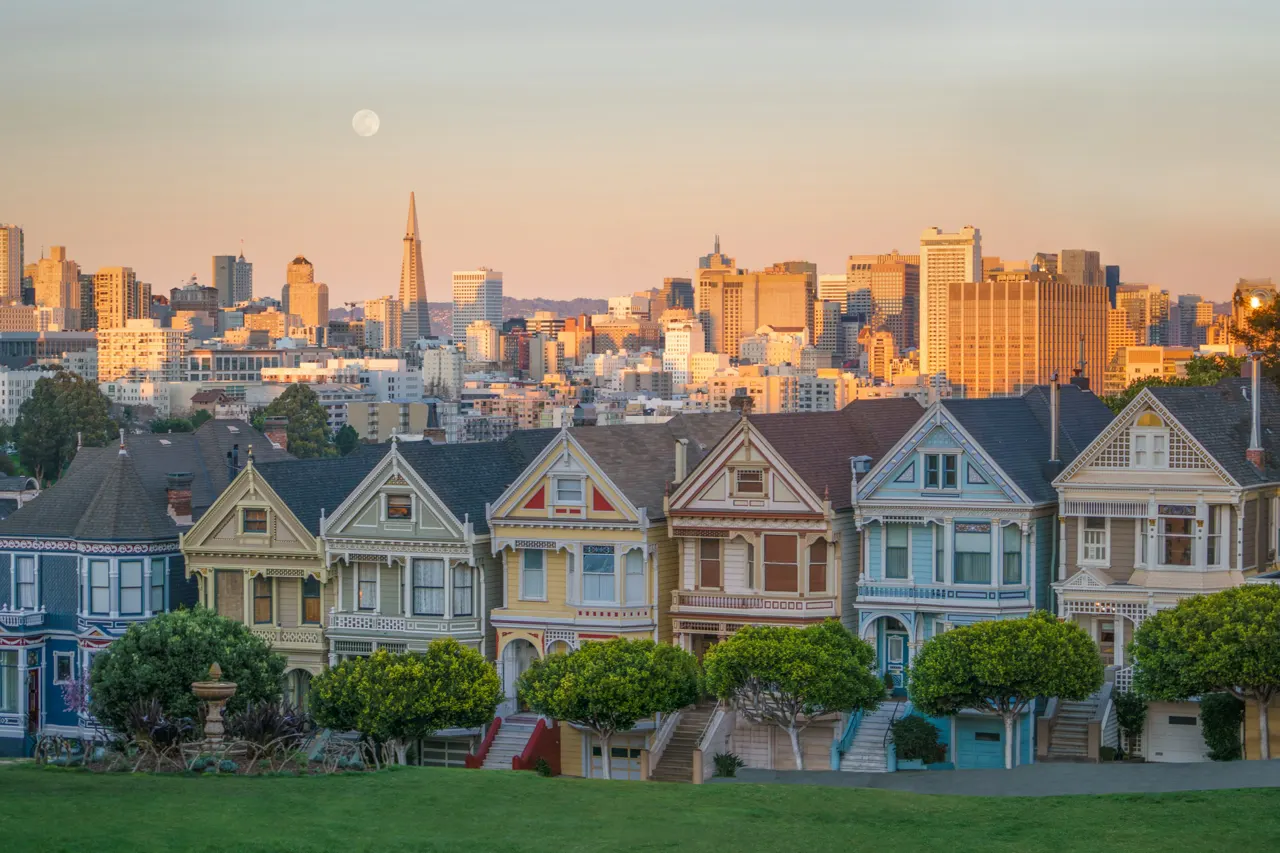 A setting moon above the famous Painted Ladies