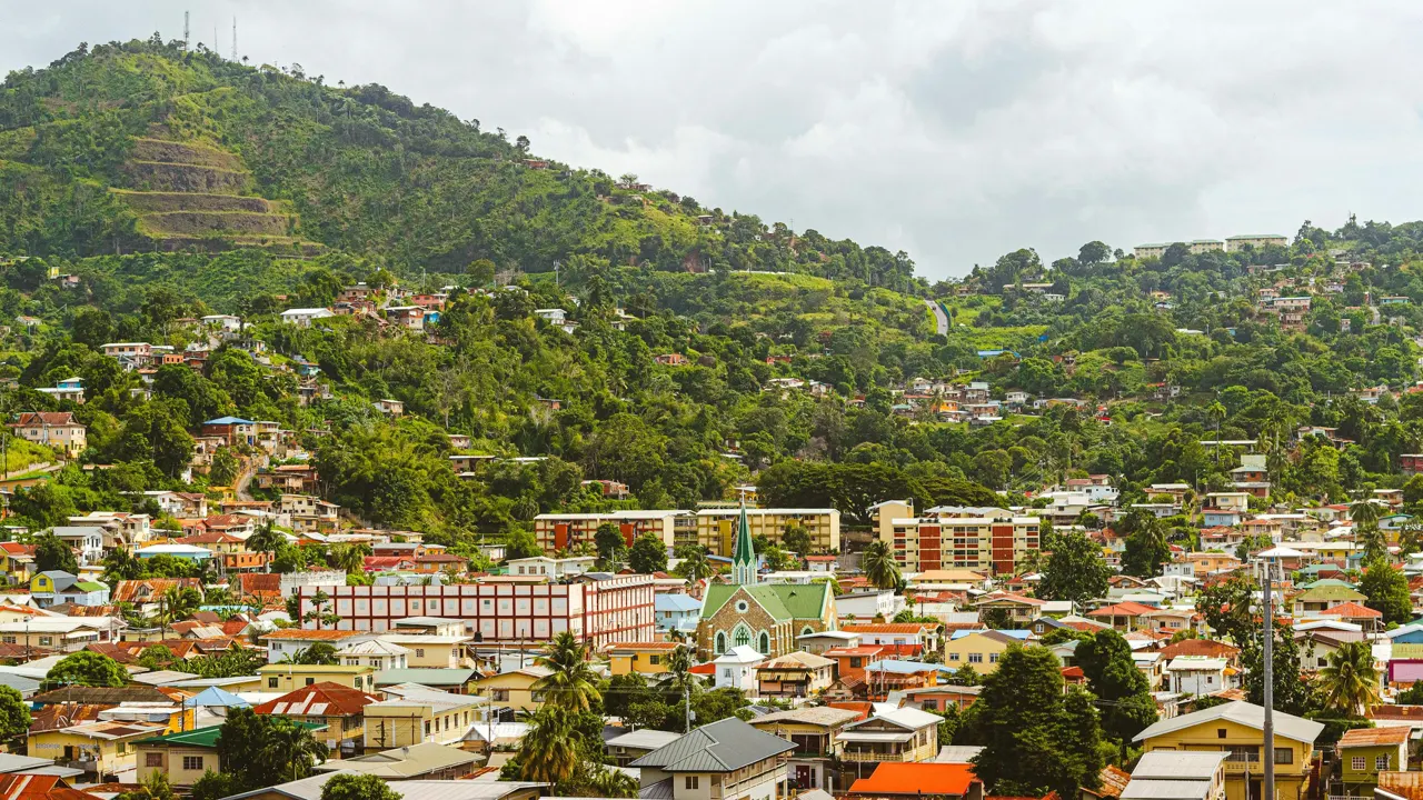 Aerial view to the green forested mountains over the east side of Port of Spain Trinidad