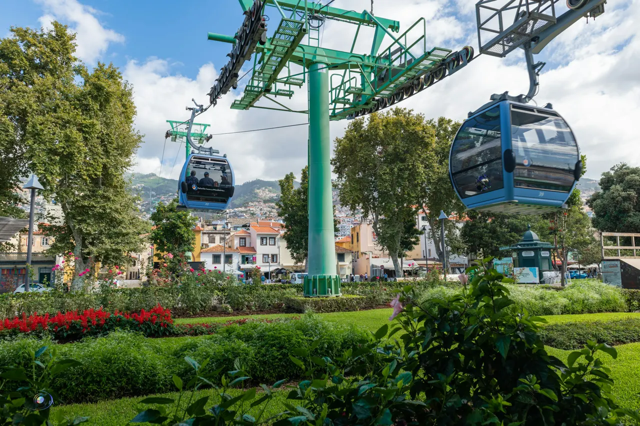 a couple of gondolas that are in the air