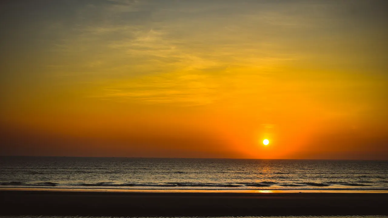 a sunset over the ocean