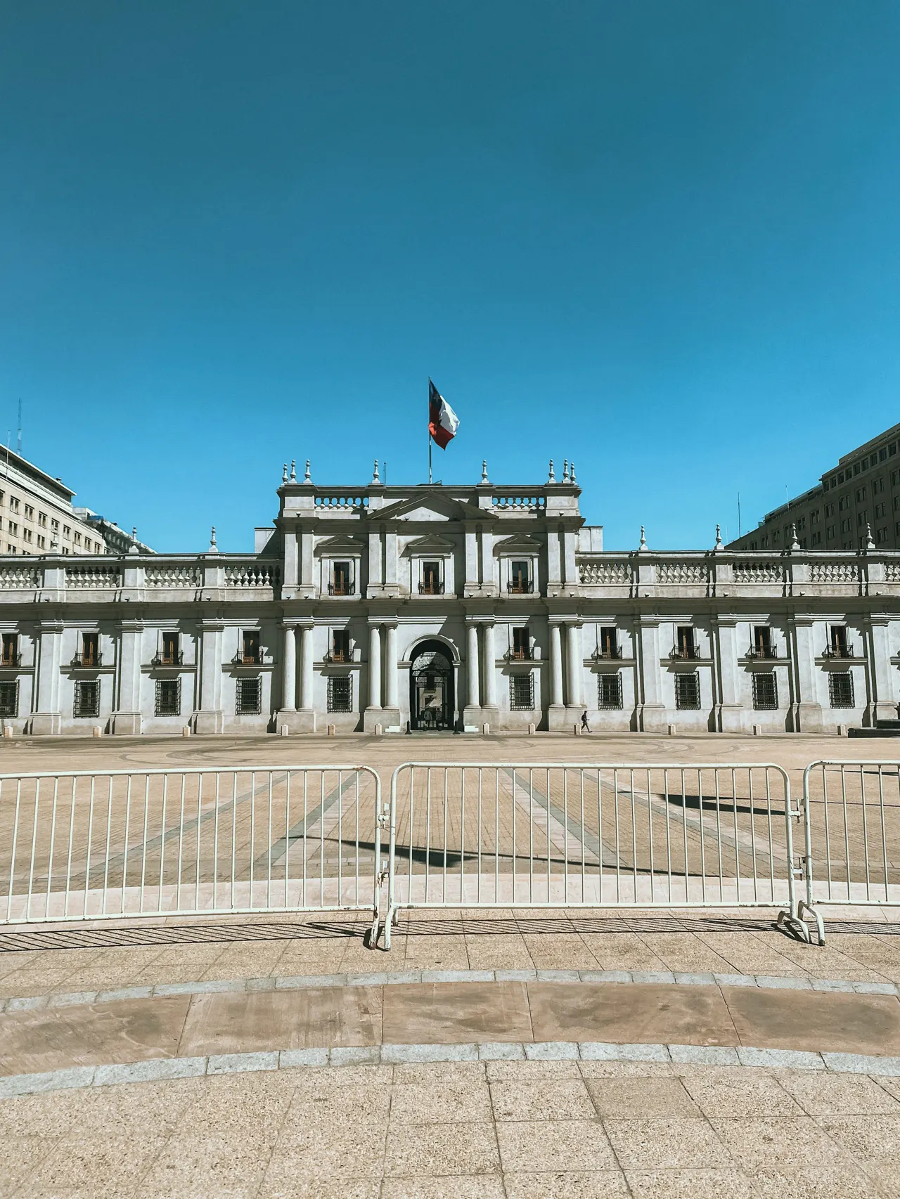 a large building with a flag on top of it