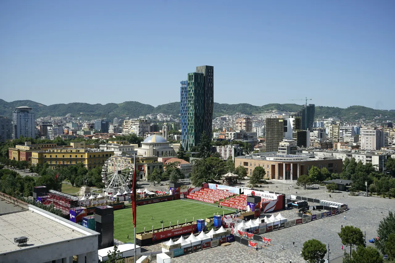 This image showcases a vibrant cityscape, likely taken in Tirana, Albania