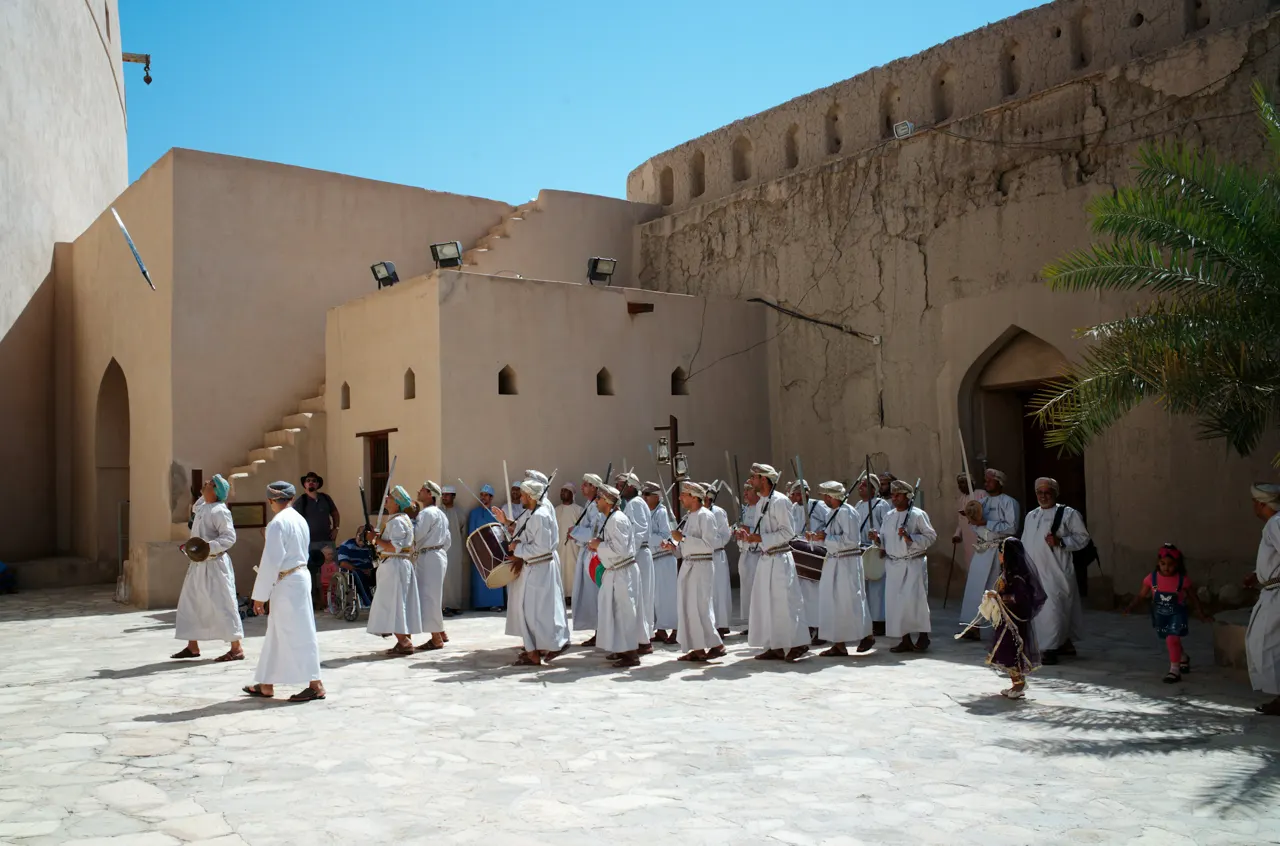 Nizwa fort's guards perform parade inside the fortress in Oman