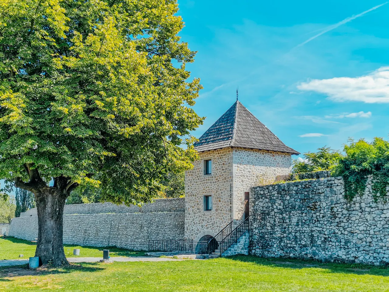 a stone building with a steeple