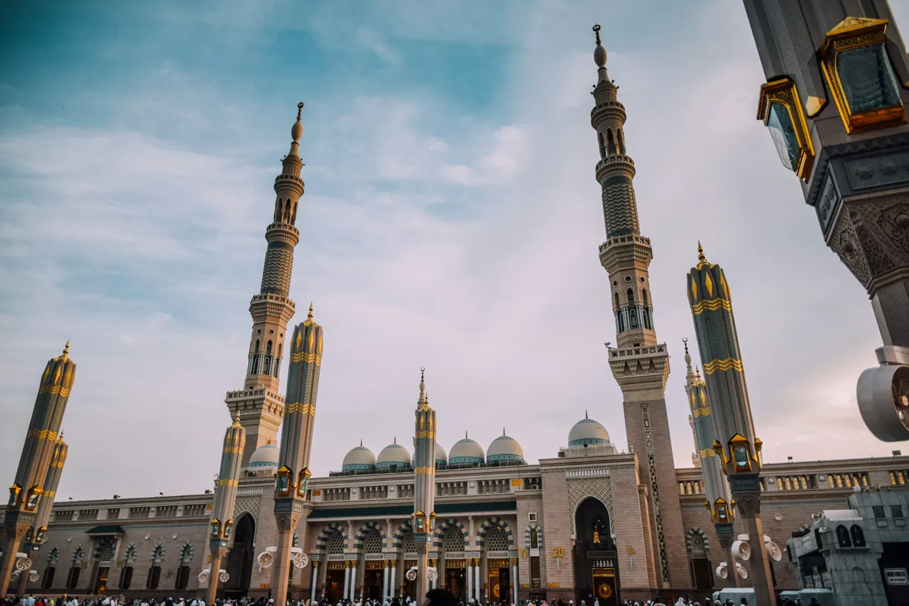 The Al-Masjid an-Nabawi mosque with tall minarets and domes in Medina, Saudi Arabia
