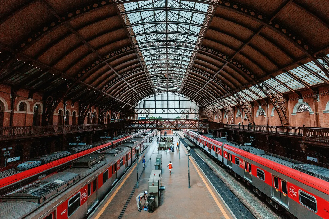 red and white train in train station