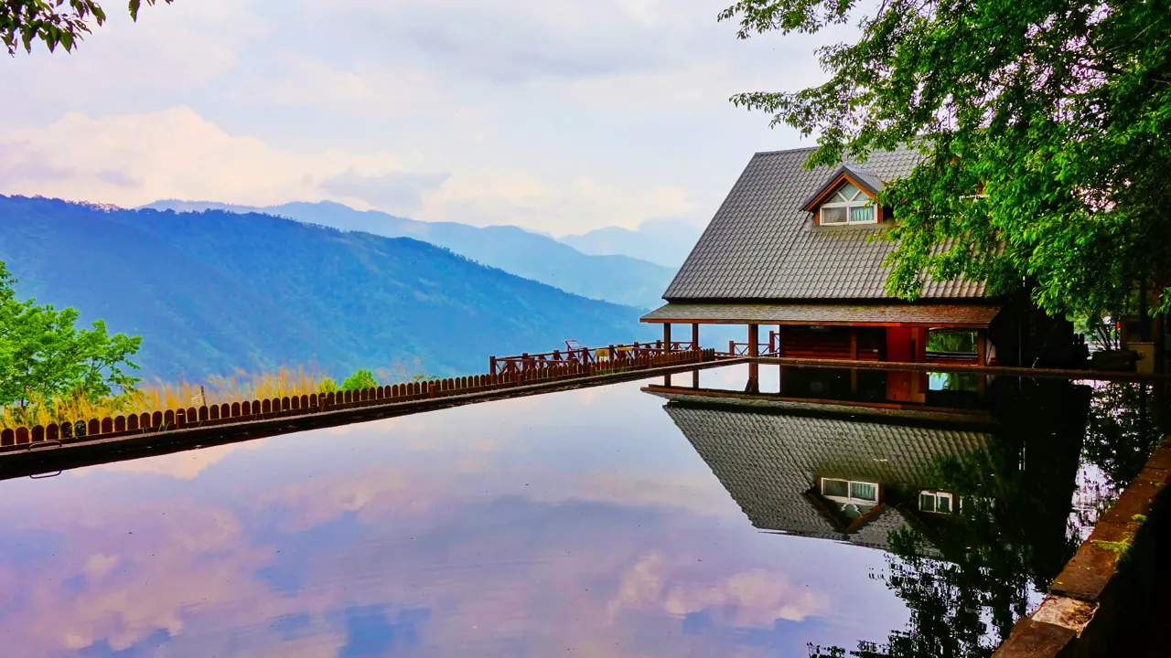 Visiting Taiwan's Wuling Farm offers the iconic Snow Mountain trailhead and serene alpine pond, a scenic and popular destination for nature enthusiasts