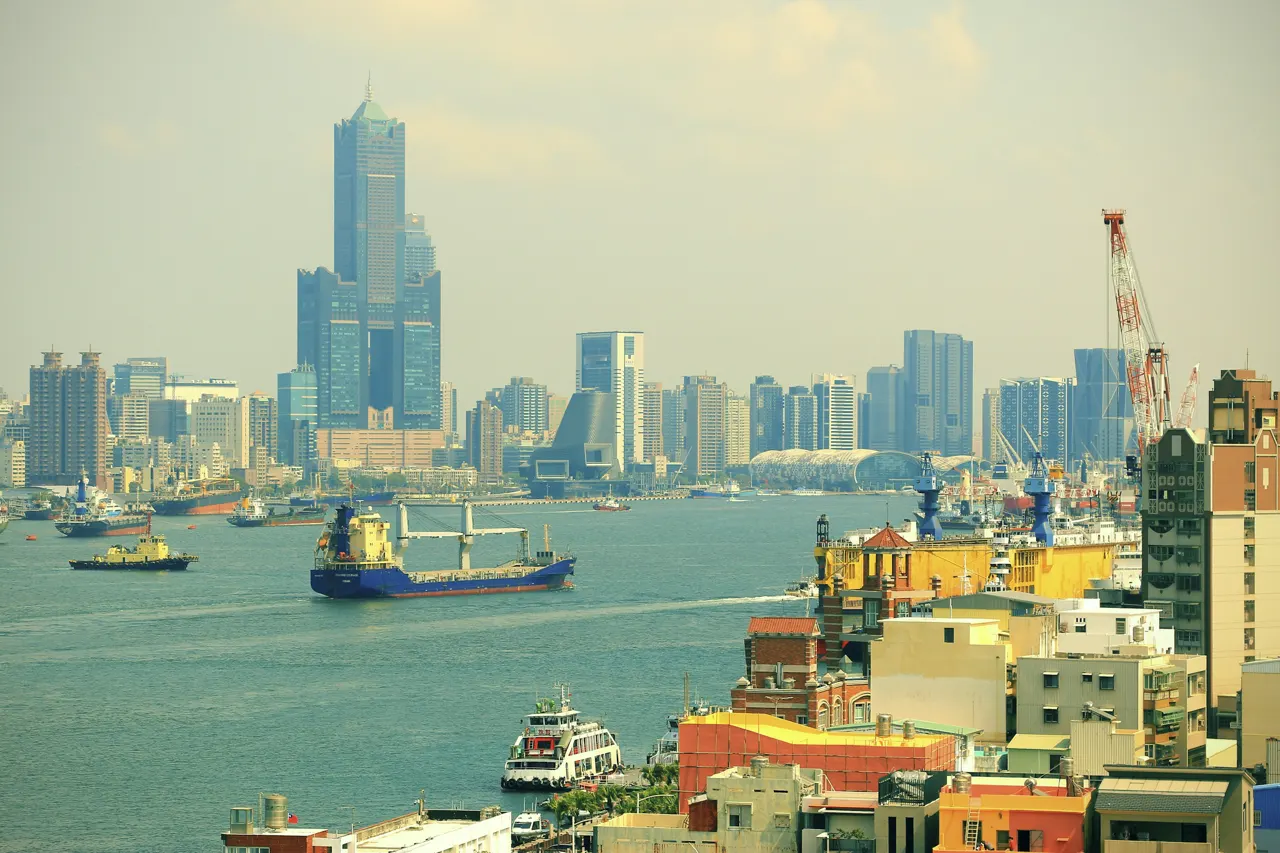 A large body of water surrounded by tall buildings