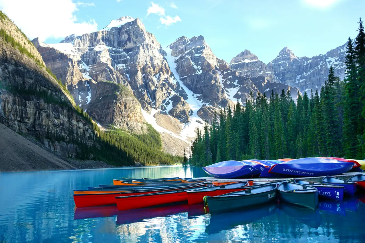 assorted-color boats on body of water