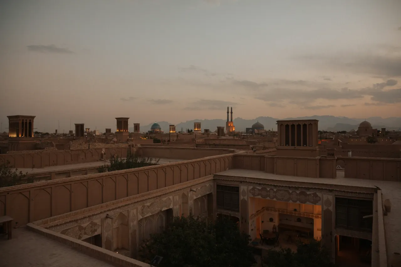 a view of a city from a rooftop of a building